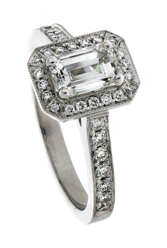 Emerald cut diamond halo engagement ring