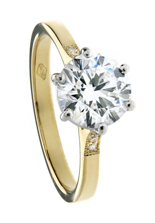 Round brilliant diamond Engagement Ring with pavé and milgrain shoulders