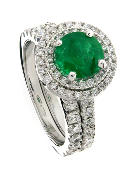 Emgagement ring with round cut green emerald in double diamond halo with diamond band.