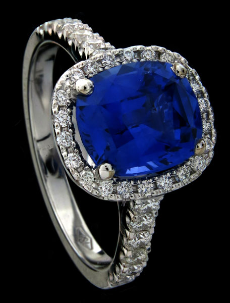 ceylon blue cushion cut sapphire in a diamond halo